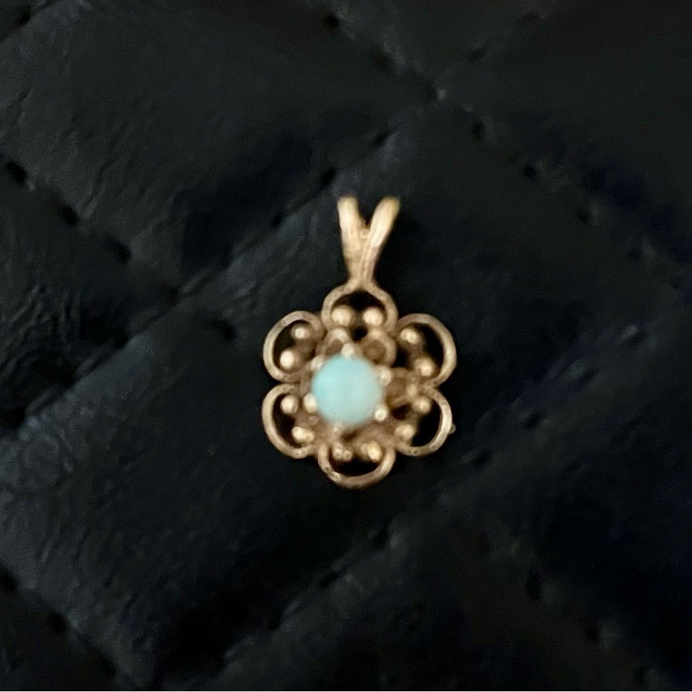 Opal filigree pendant